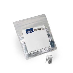 Clear zip-lock bag filled with small silver reagent sachets; label shows Hach Permachem Reagents in white box inside