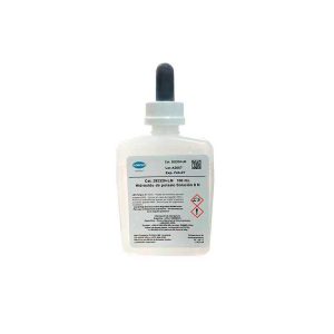 Potassium hydroxide solution bottle with dropper labeled with hazard symbols and warning text (chemical reagent)