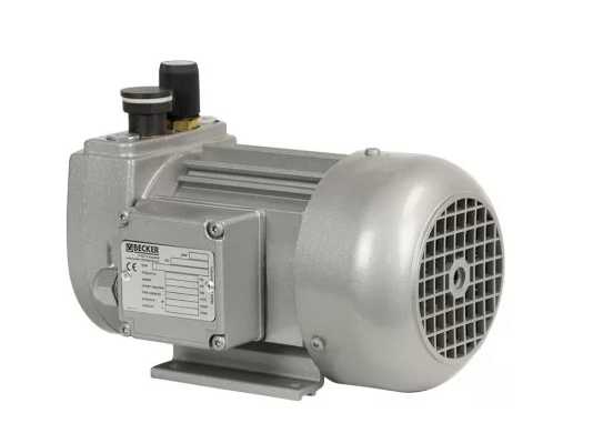 Industrial electric motor with a rounded ventilated end, mounting base, and nameplate on the side