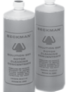 Two gray Beckman bottles with white caps, labeled Beckman solution, standing side by side on a white background.